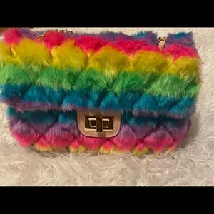 Rainbow fur purse with leather inside. chain strap